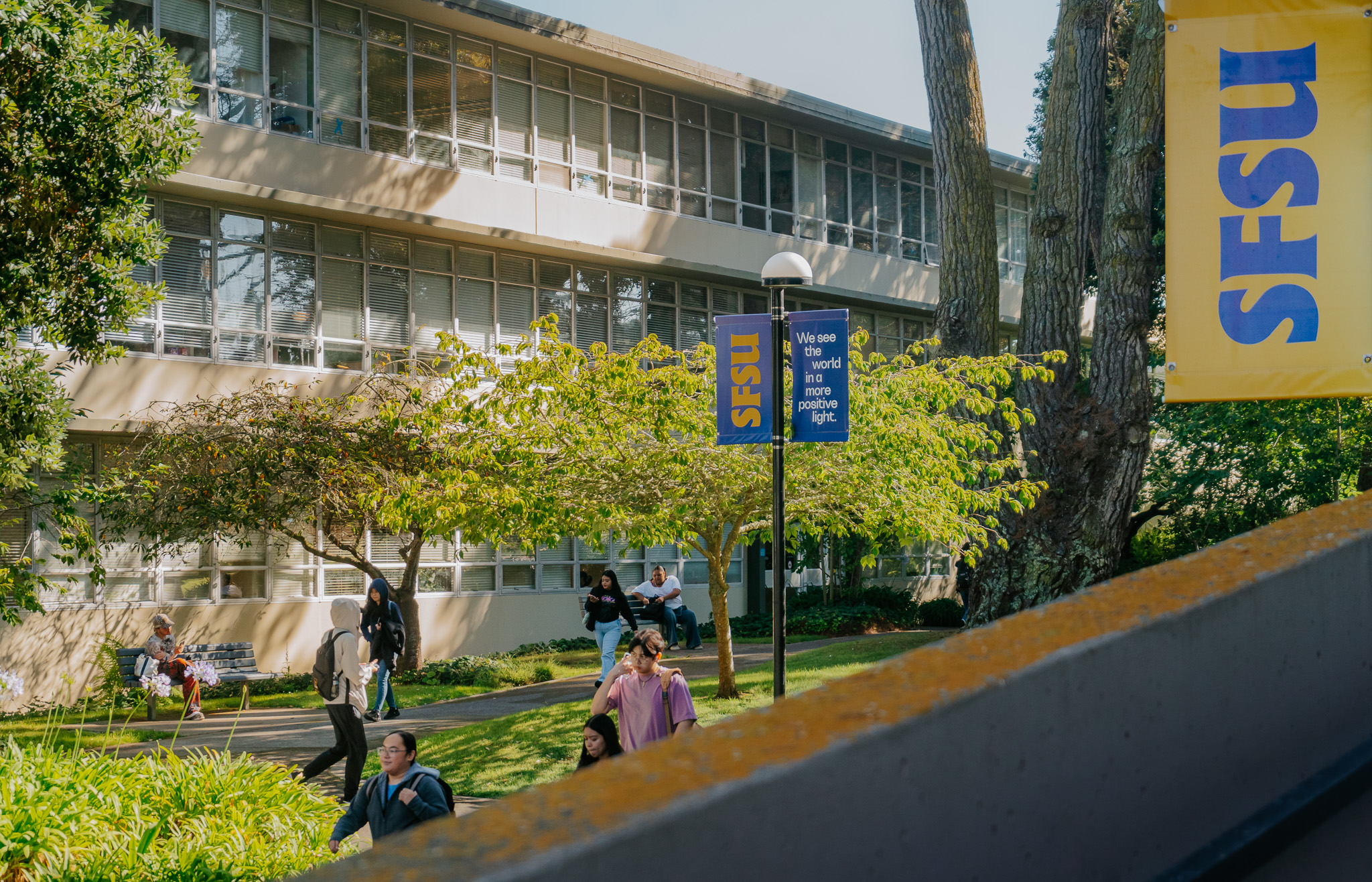 Students walking past the HSS building.