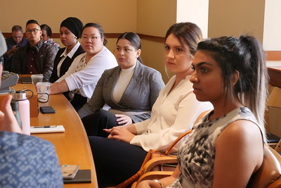 undergraduate fellows at table