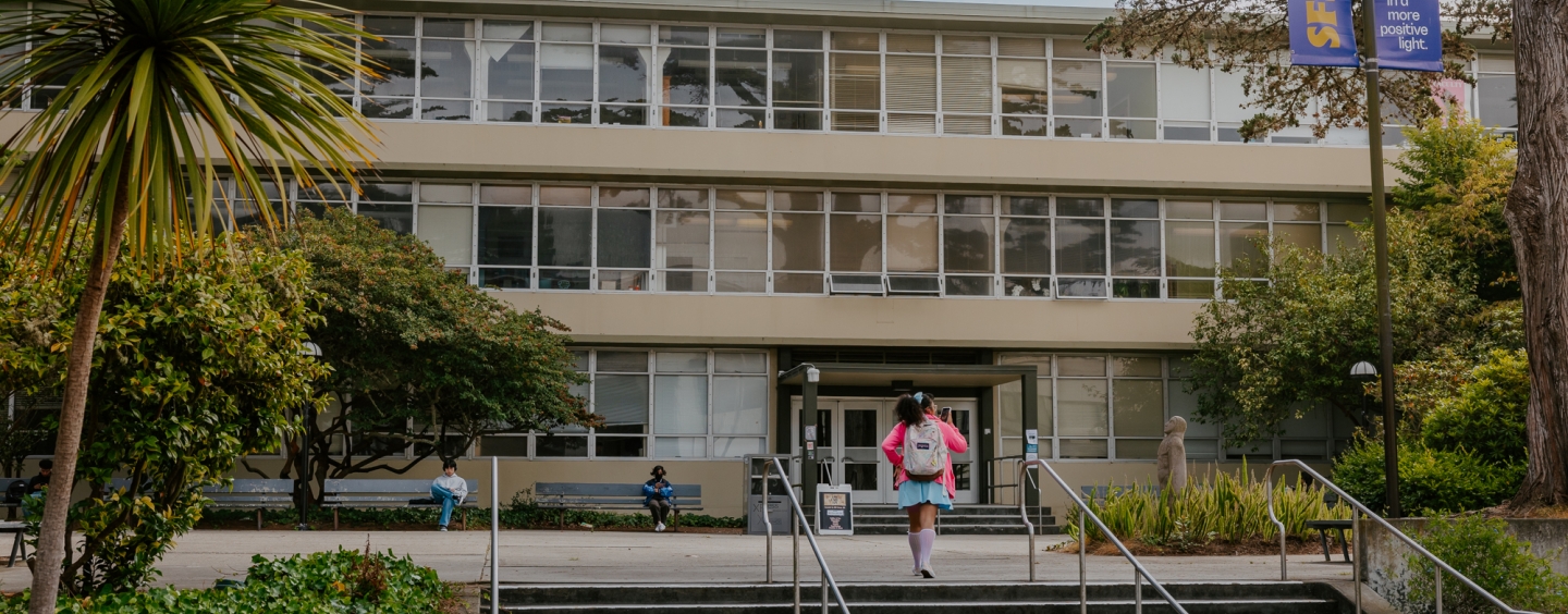 A student walking to the HSS building