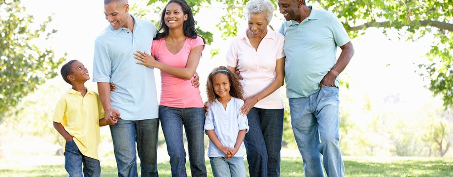 family standing outstide